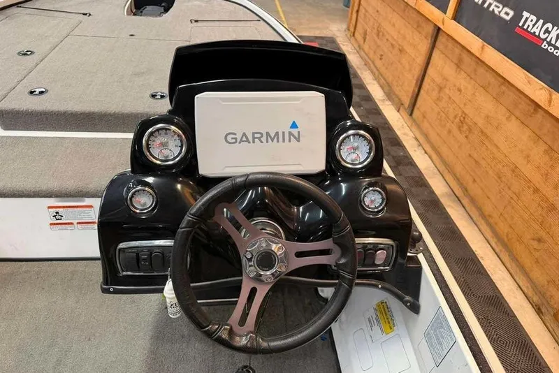 Slide: The Image of Steering console of a 2017 Nitro Z18 boat with Garmin navigation system. - 5