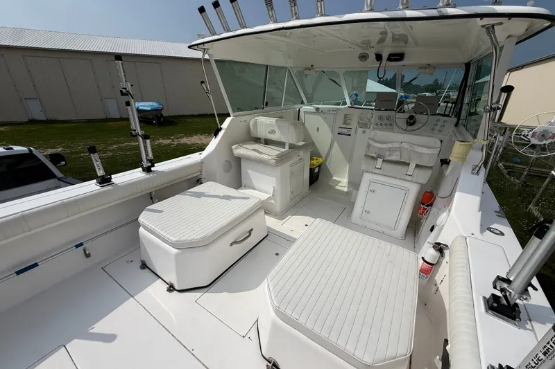 Slide: The Image of 2006 Baha Cruiser 299 SF boat interior with seating and control panel. - 9