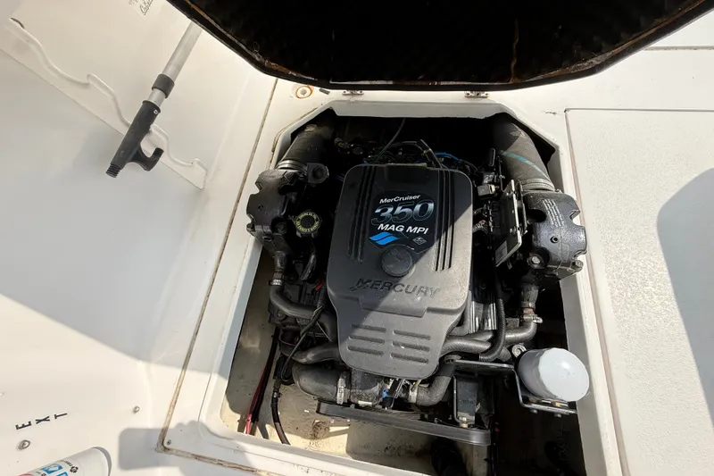Slide: The Image of Engine compartment of a 2006 Baha Cruiser 299 SF with MerCruiser 350 MAG MPI engine. - 13