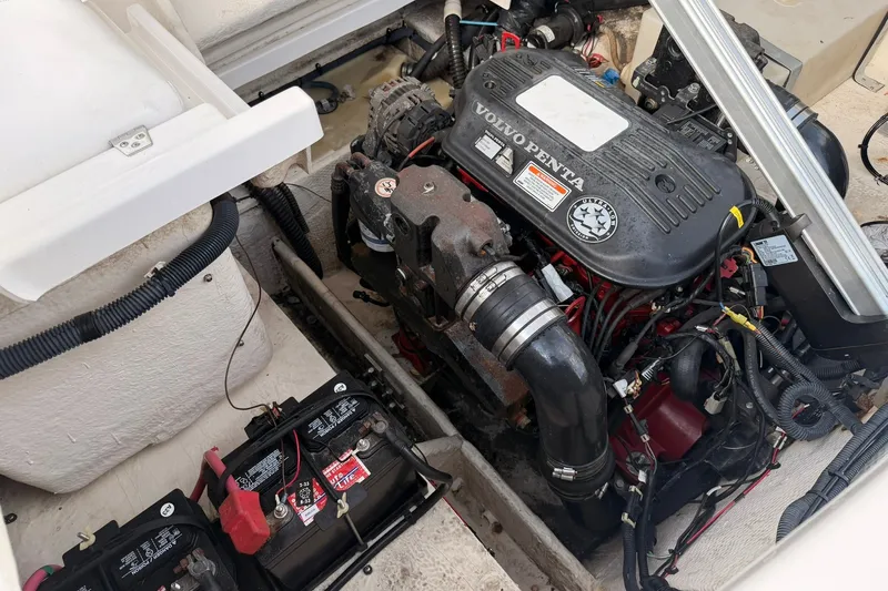 Slide: The Image of Engine compartment of a 2007 Regal 2700 Bowrider with Volvo Penta engine and batteries. - 16