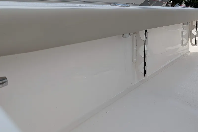 Slide: The Image of Interior view of 2027 Key West 250 Bay Reef boat, showcasing sleek white design. - 15
