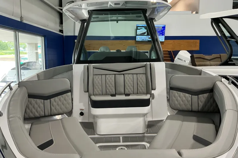 Slide: The Image of Interior view of a 2027 Monterey Elite 27 SD boat with luxurious seating. - 4