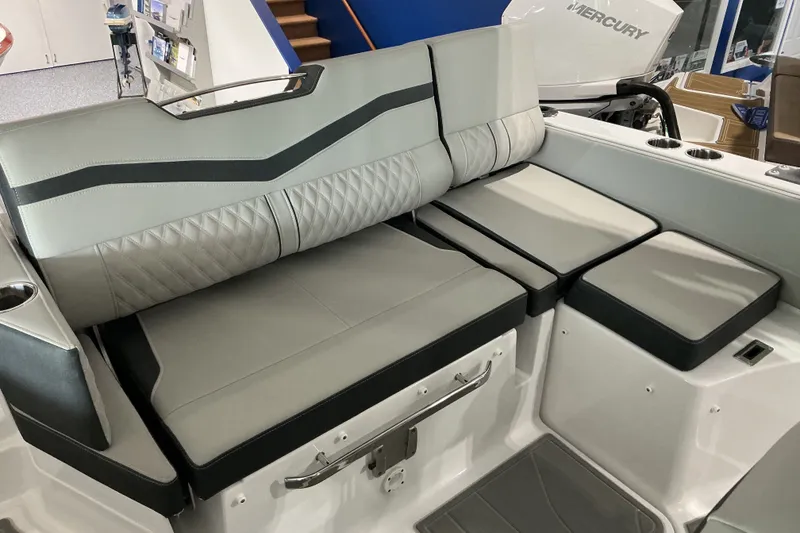Slide: The Image of 2027 Monterey Elite 27 SD boat interior with luxurious seating and modern design. - 11