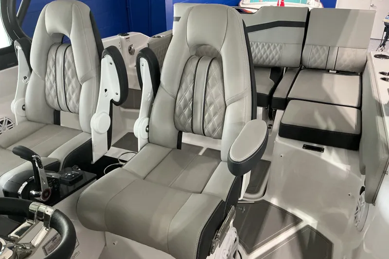 Slide: The Image of Luxurious interior of 2027 Monterey Elite 27 SD boat with plush seating and modern design. - 9