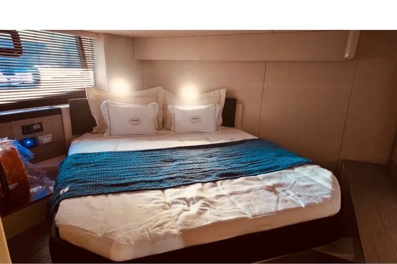 Slide: The Image of Luxurious bedroom interior of 2024 Sessa Marine C44 Cruiser yacht. - 5