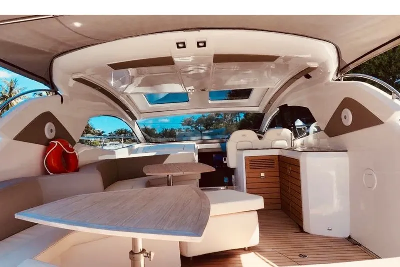 Slide: The Image of 2024 Sessa Marine C44 Cruiser interior with modern seating and sleek design. - 7