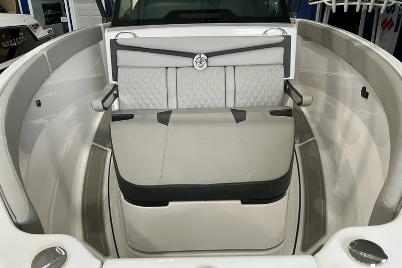 Slide: The Image of 2027 Monterey Elite 25 SD boat interior with luxurious seating and modern design. - 10