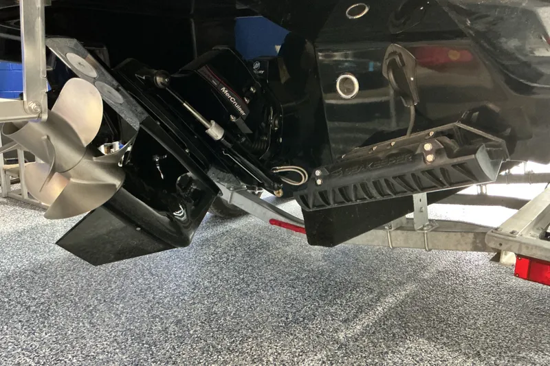 Slide: The Image of 2027 Monterey Elite 25 SD boat propeller and outdrive on a trailer. - 7