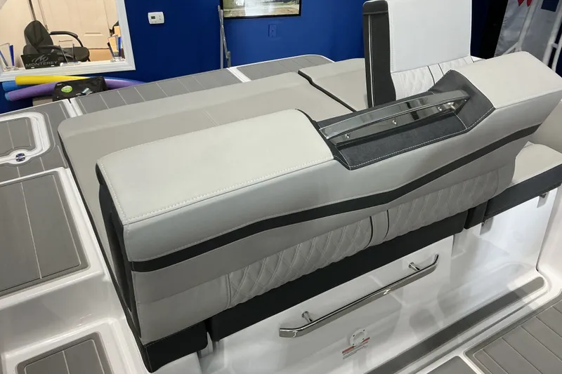 Slide: The Image of 2027 Monterey Elite 25 SD boat interior with sleek seating and modern design. - 13