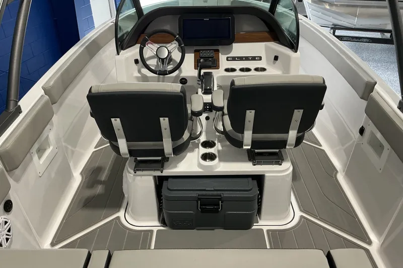 Slide: The Image of 2027 Monterey Elite 25 SD boat interior with dual seats and modern dashboard. - 15