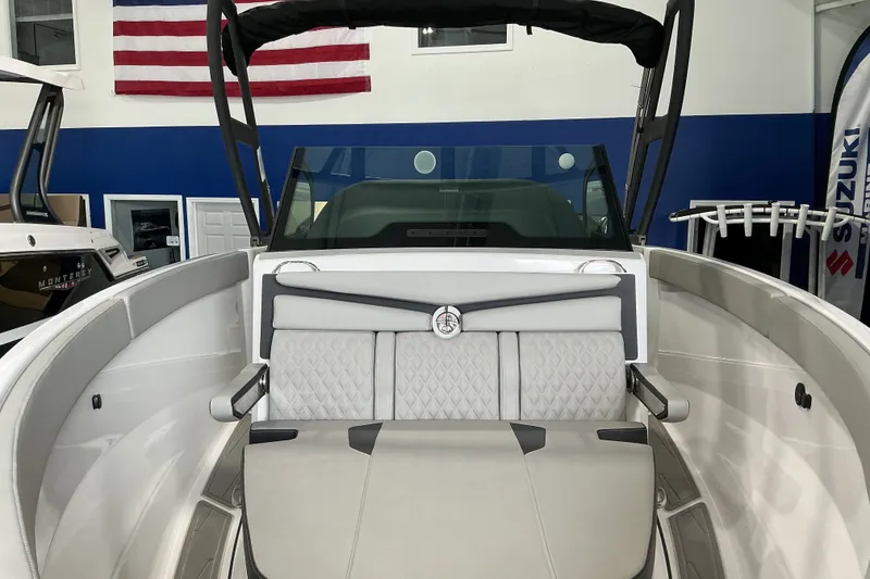 Slide: The Image of 2027 Monterey Elite 25 SD boat interior with luxurious seating and modern design. - 9