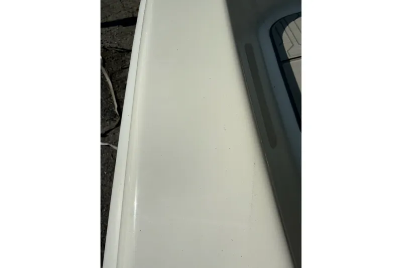 Slide: The Image of Close-up of 2025 Mako Pro Skiff 17 CC boat surface detail. - 5