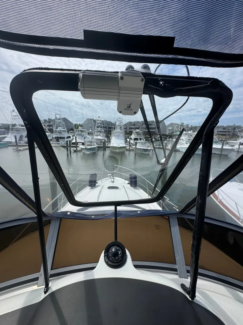 Slide: The Image of View from the flybridge of a Sea Ray 44 Sedan Bridge overlooking the marina. - 20