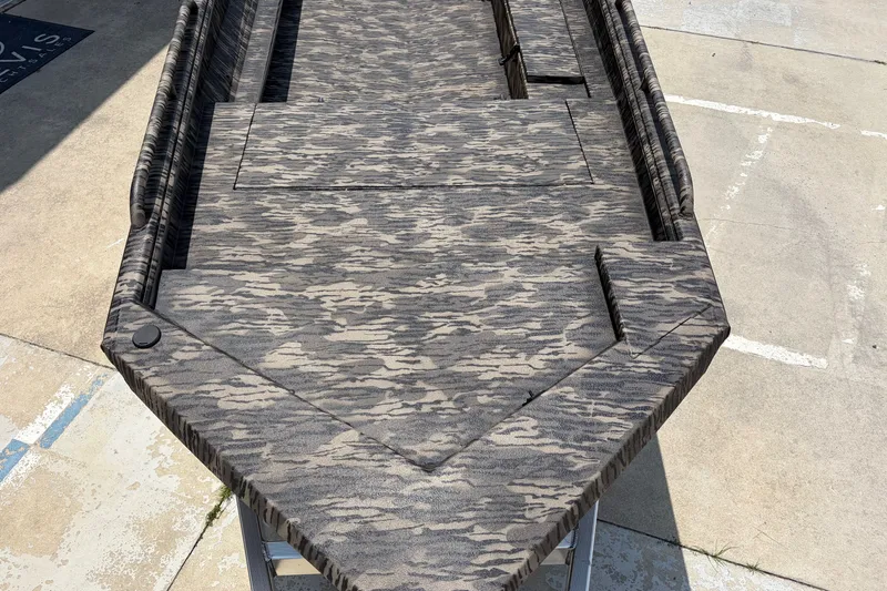 Slide: The Image of 2026 Havoc 1756 DBST boat with camouflage pattern on a concrete surface. - 6