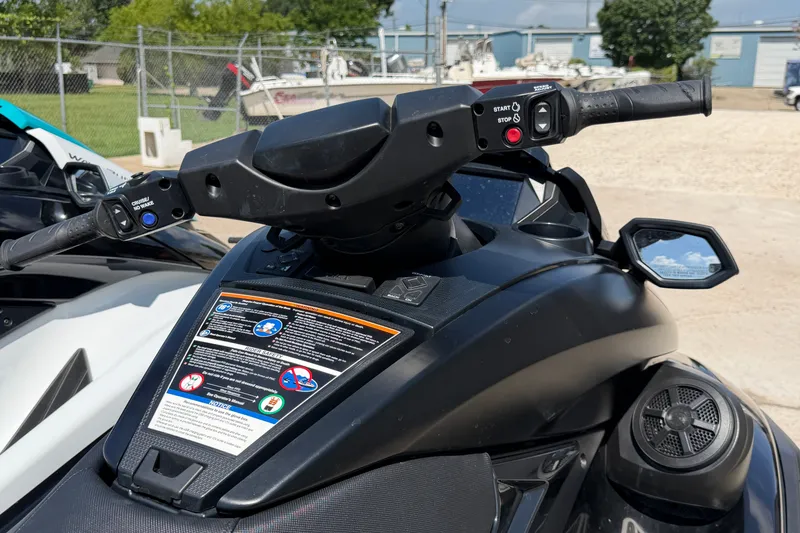 Slide: The Image of 2024 Yamaha Waverunner handlebars and controls, featuring start/stop buttons and safety instructions. - 8