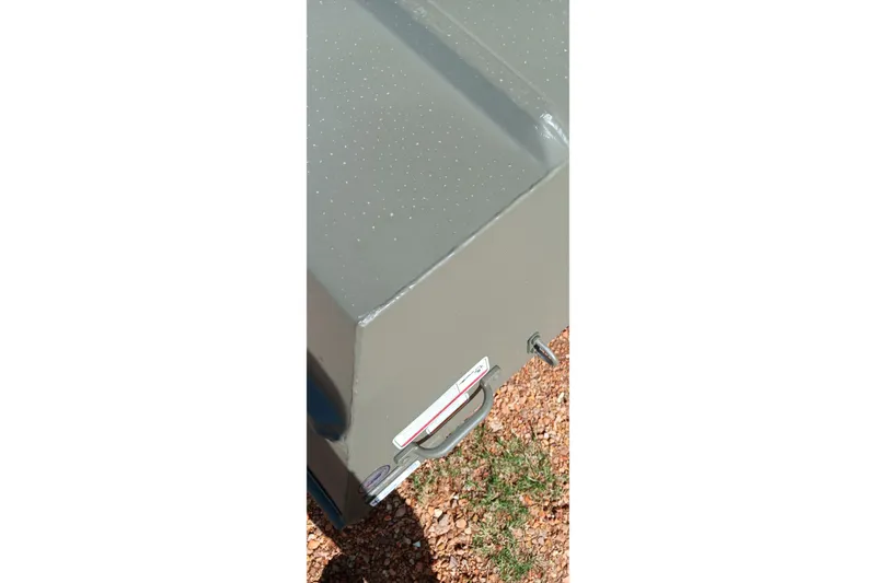 Slide: The Image of 2026 Tracker Grizzly 1436 Jon boat on gravel, showing corner detail. - 5