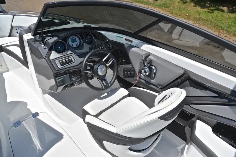 Slide: The Image of Cockpit of 2020 Monterey 218 Surf boat with modern steering and controls. - 25