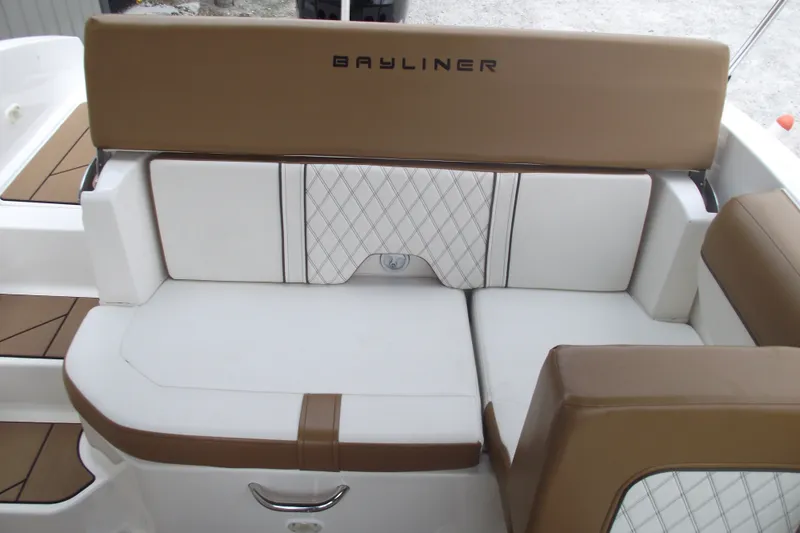 Slide: The Image of 2020 Bayliner DX 2000 boat interior with tan and white seating. - 8