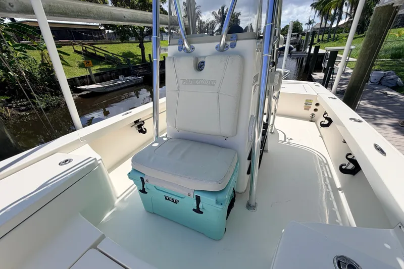 Slide: The Image of 2013 Pathfinder 2300 HPS boat interior with Yeti cooler under seat. - 67