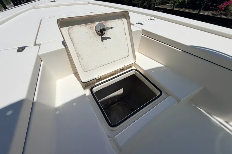 Slide: The Image of Open storage compartment on 2013 Pathfinder 2300 HPS boat deck. - 80