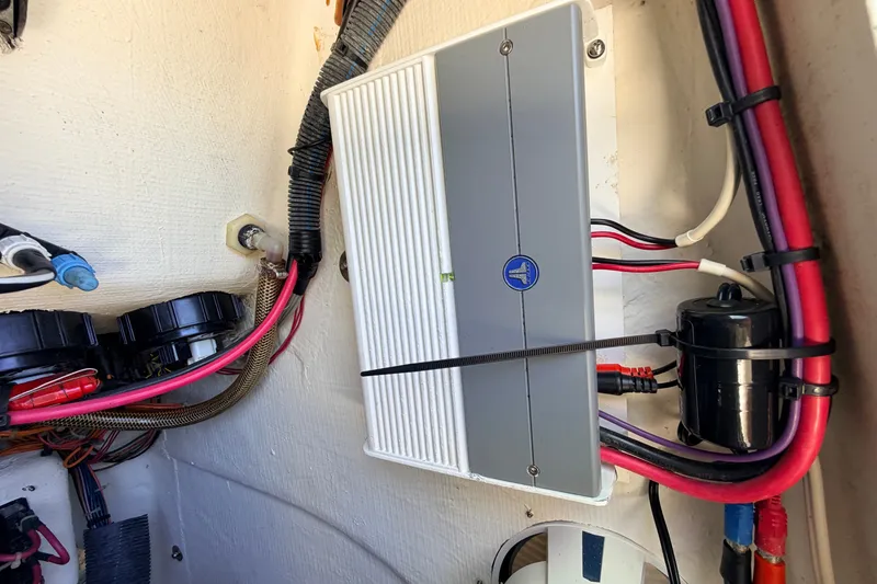 Slide: The Image of Electrical wiring and components inside a 2013 Pathfinder 2300 HPS boat. - 62