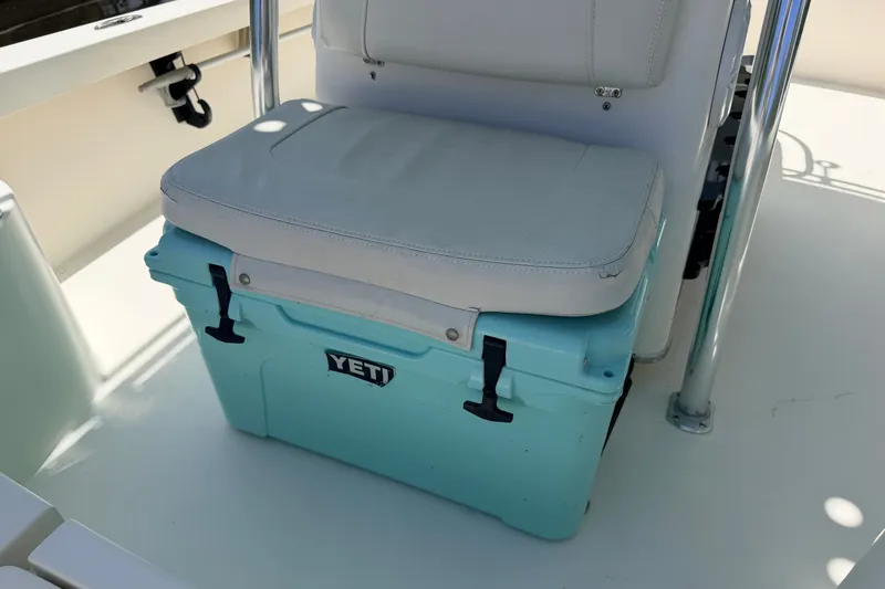 Slide: The Image of YETI cooler with cushion seat on 2013 Pathfinder 2300 HPS boat deck. - 66