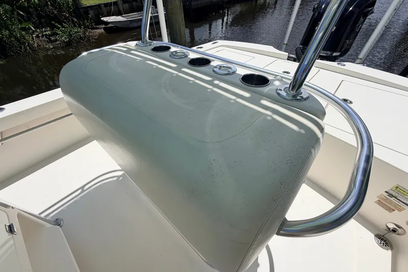 Slide: The Image of 2015 Pathfinder 2300 HPS boat console with cup holders and stainless steel railing. - 31