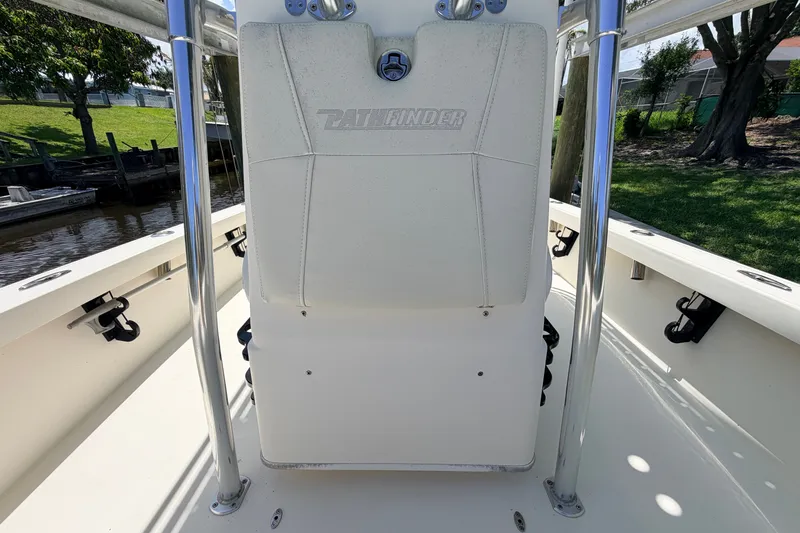 Slide: The Image of 2013 Pathfinder 2300 HPS boat interior with seating and chrome railings. - 56