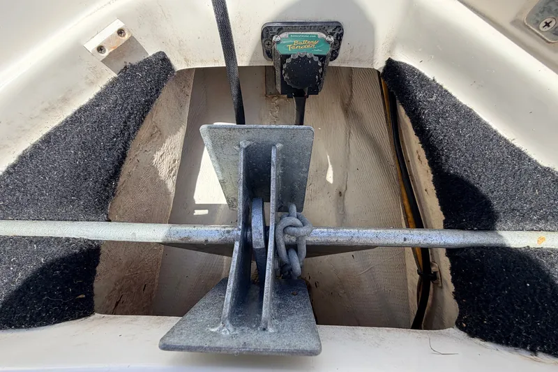 Slide: The Image of Anchor storage compartment in a 2013 Pathfinder 2300 HPS boat. - 88