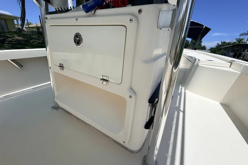 Slide: The Image of 2013 Pathfinder 2300 HPS boat interior with storage compartment and sleek design. - 38
