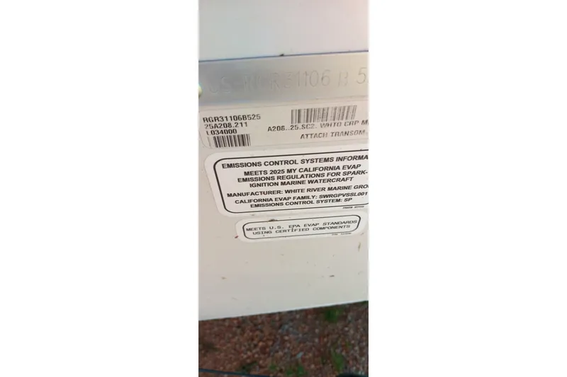 Slide: The Image of Label on Ranger ALPHA 208, 2025 model, detailing emissions control compliance and standards. - 23