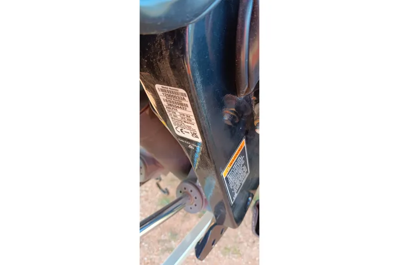 Slide: The Image of Close-up of Ranger ALPHA 208 (2025) machinery label and warning sticker. - 22