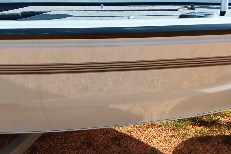 Slide: The Image of 2025 Ranger ALPHA 208 boat hull with sleek design and reflective surface. - 12