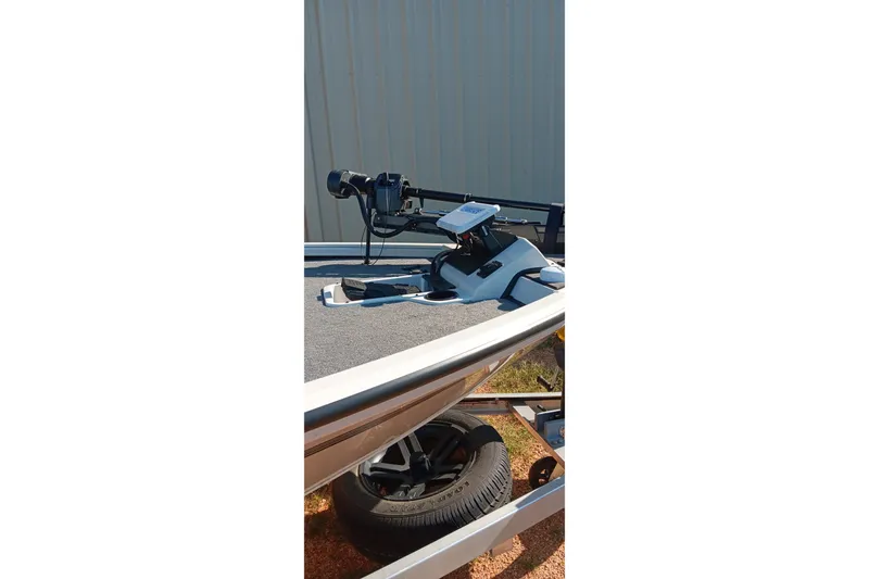 Slide: The Image of 2025 Ranger ALPHA 208 boat with advanced trolling motor on trailer. - 13