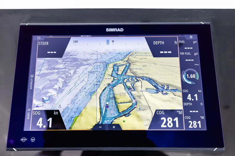 Slide: The Image of Simrad navigation display on 2001 Viking 55 Convertible yacht, showing nautical chart and data. - 16