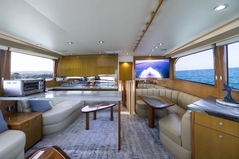 Slide: The Image of Luxurious interior of a 2001 Viking 55 Convertible yacht with modern amenities. - 31