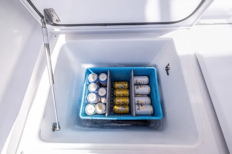 Slide: The Image of Cooler with assorted beverage cans on 2001 Viking 55 Convertible yacht. - 22