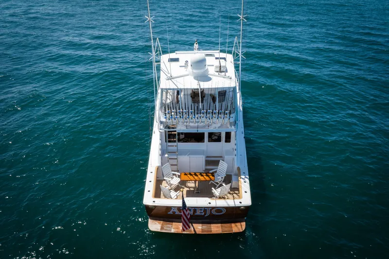 Slide: The Image of 2001 Viking 55 Convertible yacht on open water, aerial view. - 62