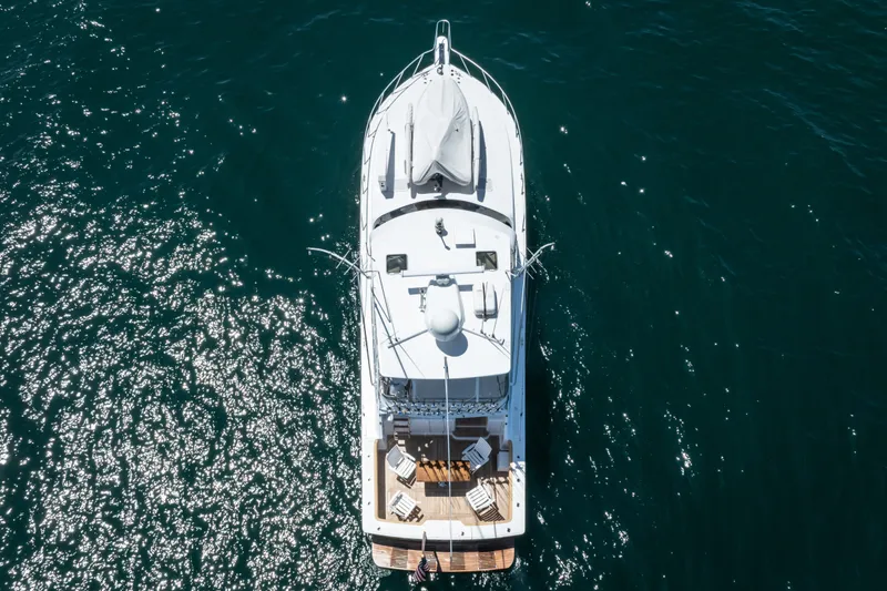 Slide: The Image of Aerial view of 2001 Viking 55 Convertible yacht on sparkling water. - 61