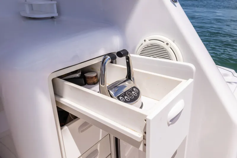 Slide: The Image of Control panel on 2001 Viking 55 Convertible yacht, featuring sleek design and ocean backdrop. - 15