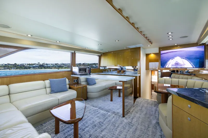 Slide: The Image of Luxurious interior of a 2001 Viking 55 Convertible yacht with modern amenities and scenic views. - 30