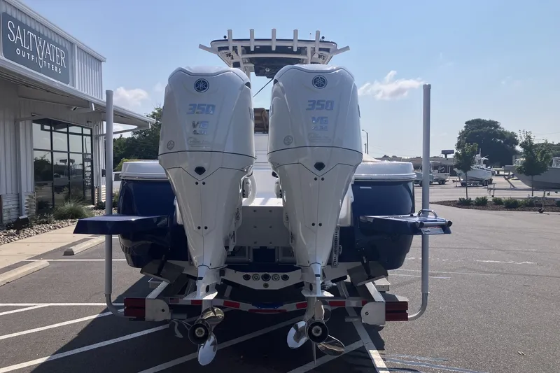 Slide: The Image of 2027 Caymas 291 boat with dual 350 horsepower engines at Saltwater Outfitters. - 4