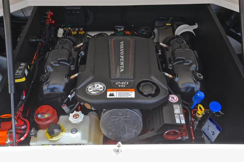 Slide: The Image of Engine compartment of a 2020 Regal LS2 Surf boat featuring a Volvo Penta engine. - 29