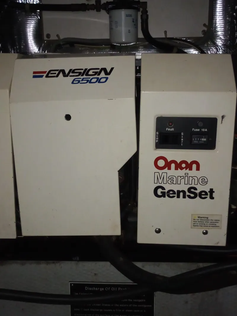 Slide: The Image of An Onan Marine Generator in a 1991 Silverton AFT CABIN boat. - 47