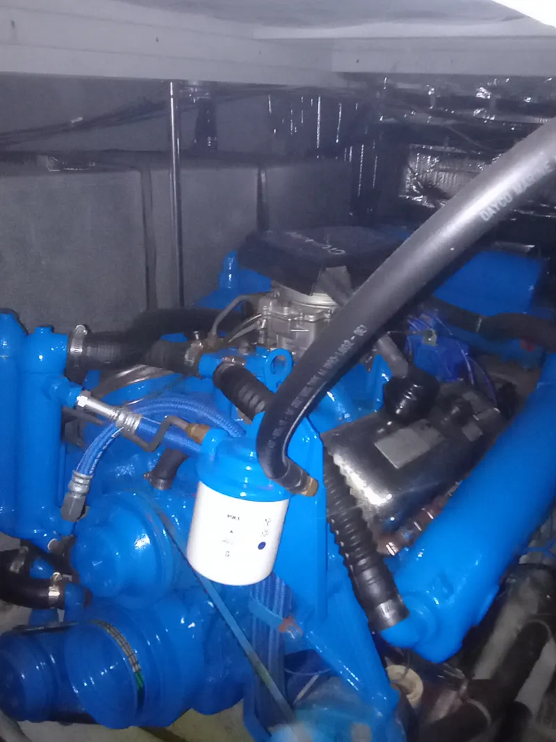Slide: The Image of A blue-painted engine inside a 1991 Silverton AFT CABIN. - 41