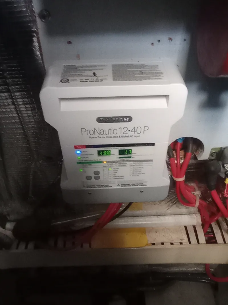 Slide: The Image of A ProNautic 12-40P charger in a boat engine compartment. - 44
