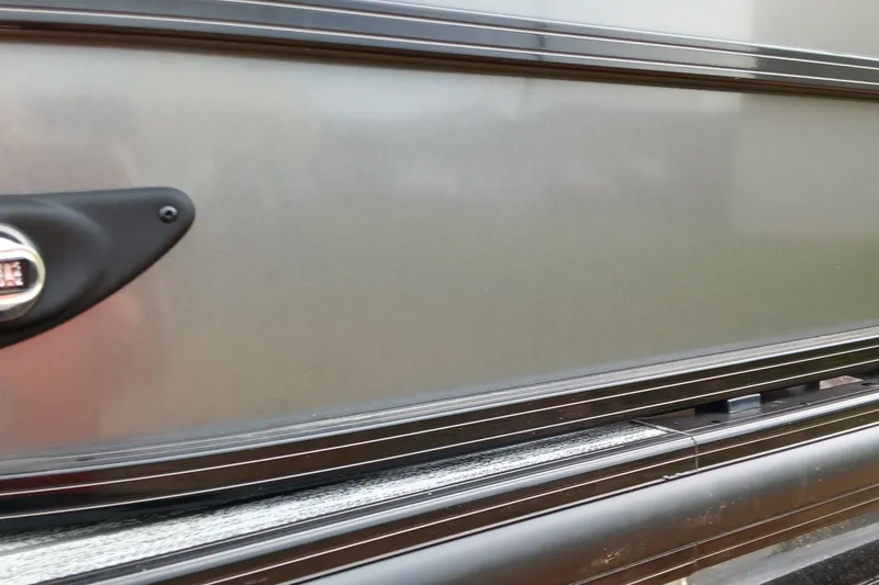 Slide: The Image of Close-up of 2026 Ranger 220F exterior detail with sleek design and metallic finish. - 24