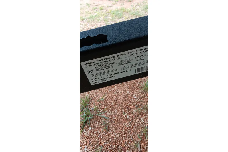 Slide: The Image of Label on Ranger 220F 2026 trailer, displaying specifications and manufacturing details. - 34