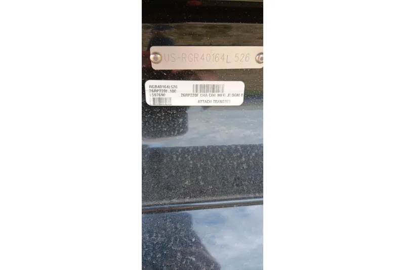 Slide: The Image of Close-up of a 2026 Ranger 220F model identification plate with serial numbers. - 36