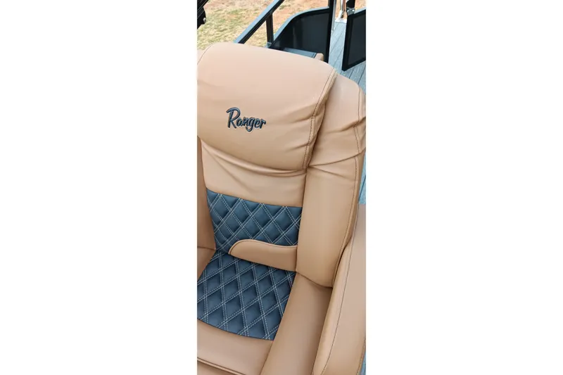 Slide: The Image of Luxurious tan and blue seat of 2026 Ranger 220F boat. - 20